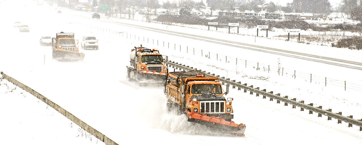 Convoy of snow plows