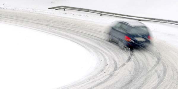 Car on a snowy winter road