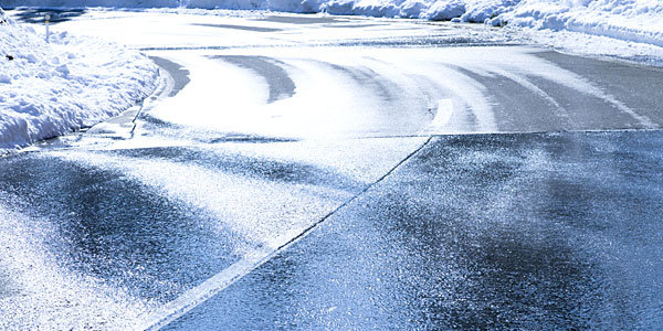 Icy winter road with curve